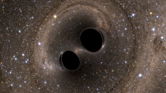 Tietokoneella tehty visualisointi kahdenmustan aukon törmäämisestä vuodelta 2016, jolloin Ligo havaitsi ensimmäiset varmat signaalinsa. Kuva: LIGO Laboratory