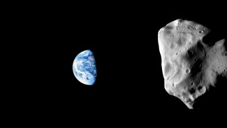 Maapallo ja asteroidi Lutetia liitetty samaan kuvaan
