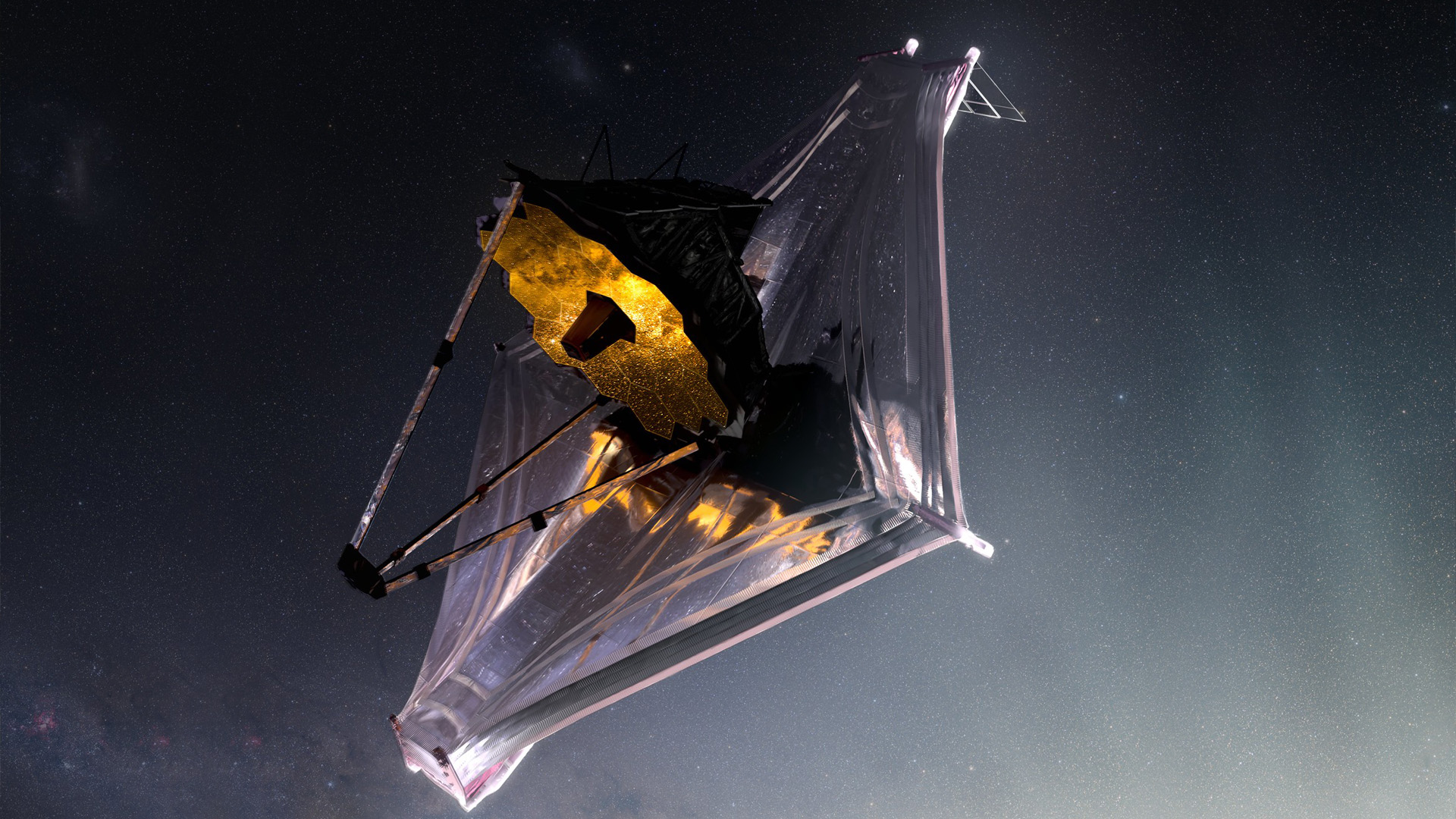 James Webb -avaruusteleskooppi. Piirros ei ole aivan luonnollinen, sillä todellisuudessa lähes tenniskentän kokoisen aurinkosuojan päällä oleva teleskooppi on täysin pimeässä. Sitä ei siis voisi nähdä näin hyvin – itse asiassa ei lainkaan. Kuva: Nasa